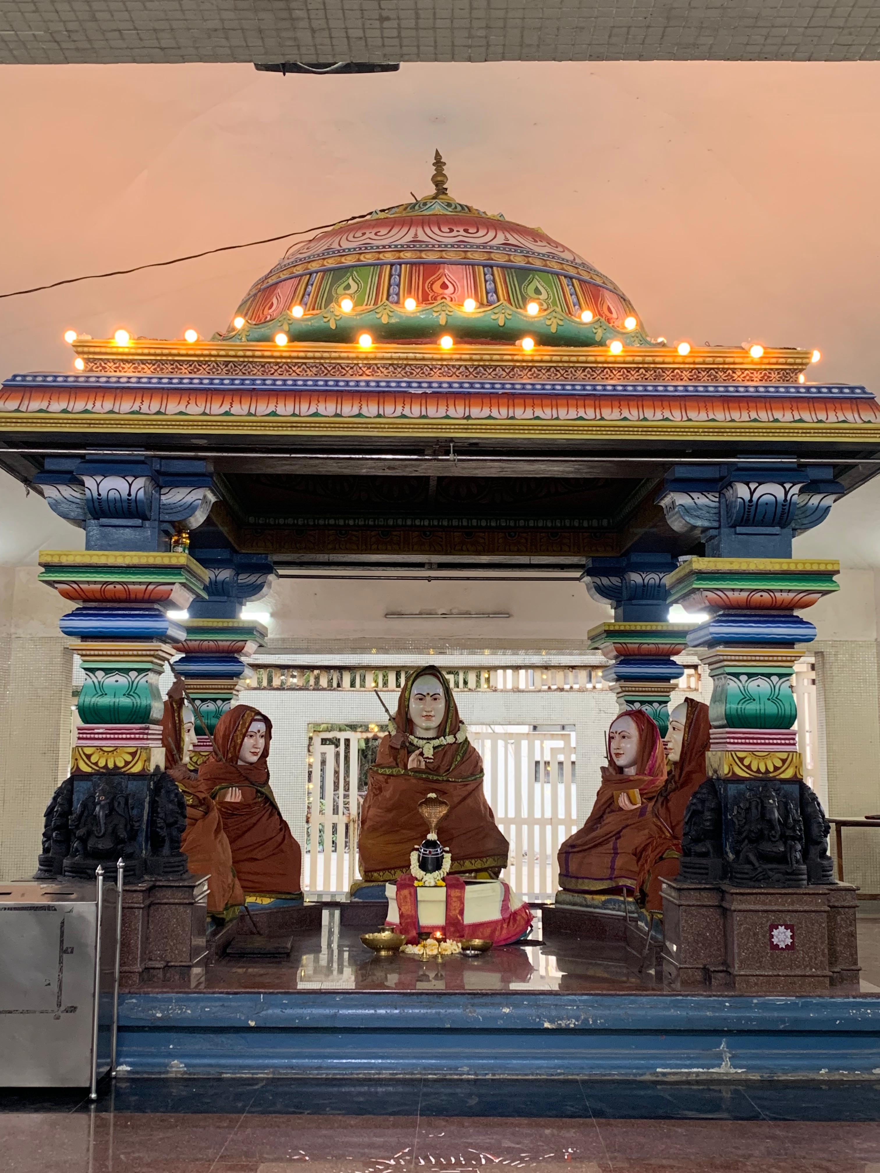 Sri Adi Shankara seated beneath an ornate canopy with his four principal disciples